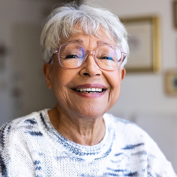 Portrait Of A Beautiful Mixed Race Senior Woman In Her Home